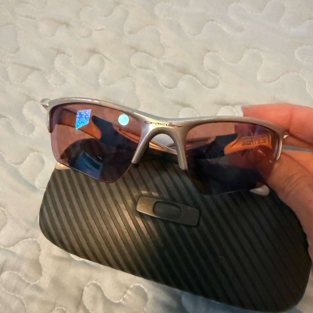 Oakley Sunglasses - Silver with Red Lenses. Case included
